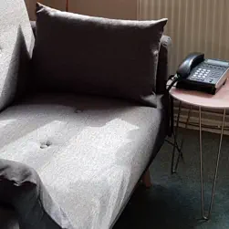 office with sofa and armchair