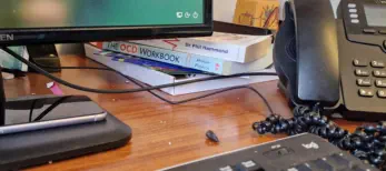 Office desk with phone and monitor